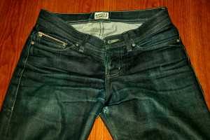 distressed raw denim jeans